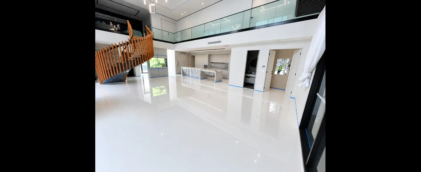 High-gloss white epoxy flooring in a modern Sydney home